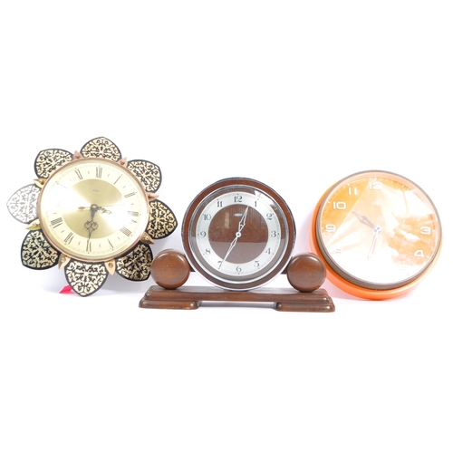 623 - A collection of three British made Metamec clocks. Manufactured in Derham, Norfolk, these Metamec cl... 