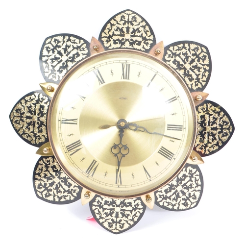 623 - A collection of three British made Metamec clocks. Manufactured in Derham, Norfolk, these Metamec cl... 