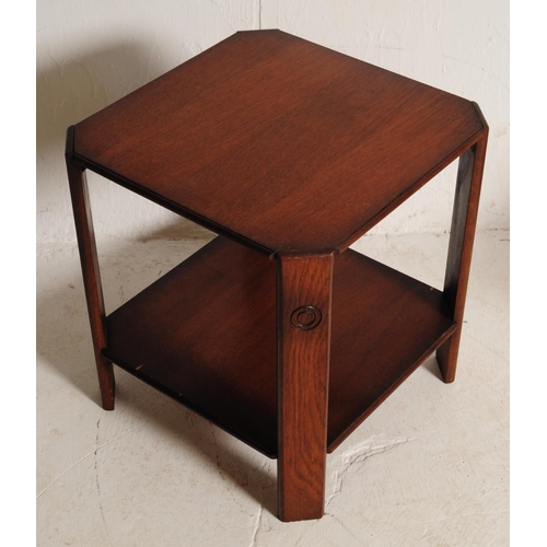 636 - Two mid 20th century Art Deco style oak side tables. To include an example with octagonal top with r... 