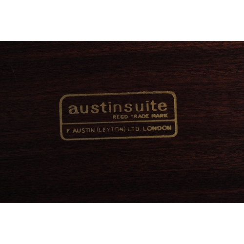637 - Austinsuite - A retro mid 20th century Austinsuite teak desk. The desk having central kneehole flank... 
