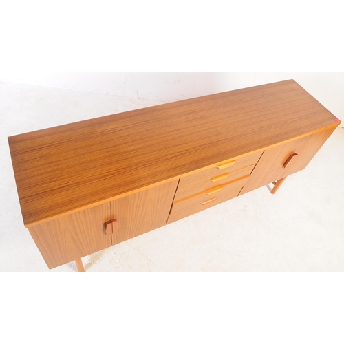 639 - British Modern Design - A retro mid 20th century circa 1960s teak veneer sideboard. The sideboard ha... 