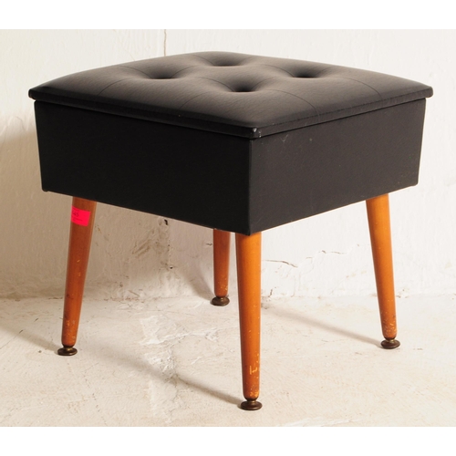 645 - Sherbourne - A retro mid 20th century circa 1960s black vinyl sewing box. The sewing box having cush... 