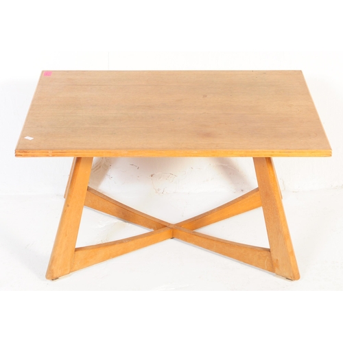 649 - Utility Furniture - A mid 20th century circa 1950s post war utility coffee table. The table having a... 