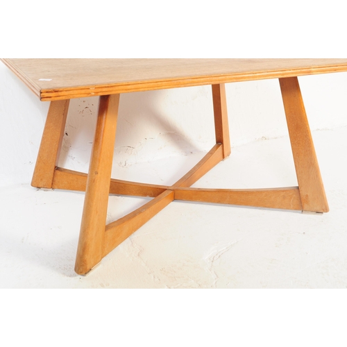 649 - Utility Furniture - A mid 20th century circa 1950s post war utility coffee table. The table having a... 