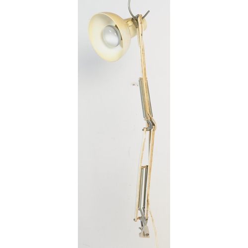 661 - A mid-century industrial Anglepoise bracket mounted desk lamp with pendant shade in white colourway.... 