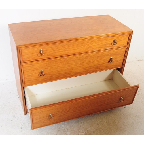 663 - G-Plan - A late 20th century Danish manner teak wood bedroom suite comprising dressing table and che... 