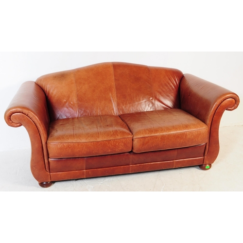 667 - A good contemporary Chesterfield / club  leather sofa settee. Raised on bun feet with arched barrel ... 