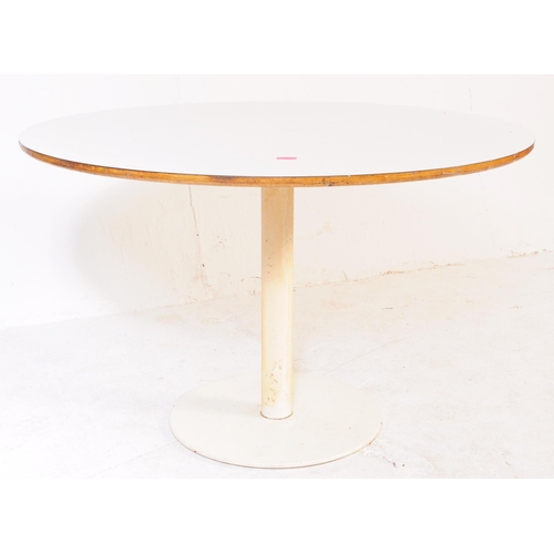 672 - A vintage mid century round dining table with flat base in the manner of Arkana. With formica top, i... 