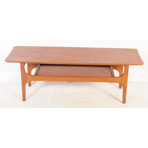 678 - British Modern Design - A retro mid 20th century teak coffee table having rectangular top over under... 