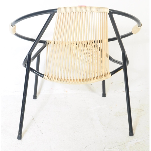 681 - Lusty Boulevard - A retro 20th century string / strap monochrome egg chair. The chair having backres... 