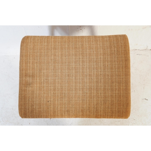 687 - A retro mid 20th century upholstered footstool. The footstool having top upholstered in a cream chec... 