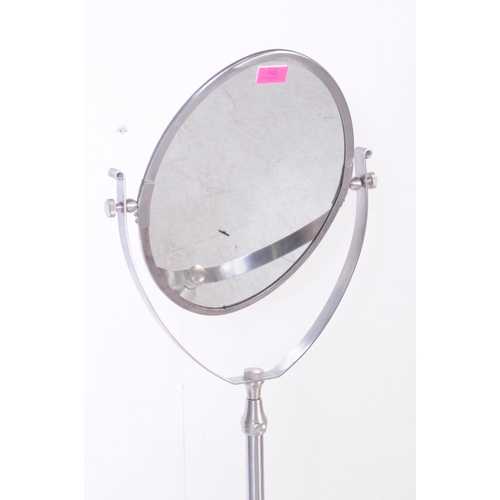 702 - A contemporary large 20th century chrome easel floor standing mirror. Chrome base with column uprigh... 