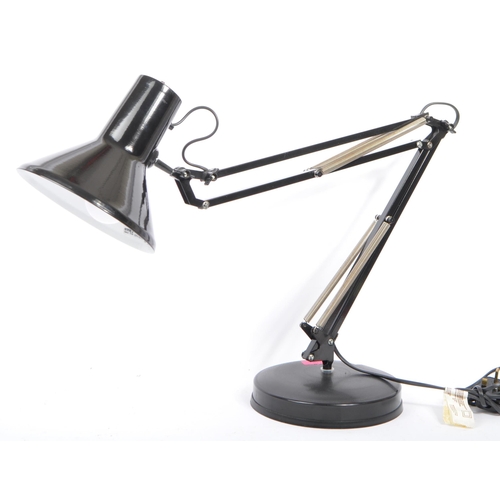 710 - Emmedi - A 1980s Anglepoise desk lamp in black colourway by Emmedi. The lamp with a rotating stem an... 