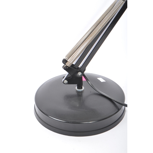 710 - Emmedi - A 1980s Anglepoise desk lamp in black colourway by Emmedi. The lamp with a rotating stem an... 