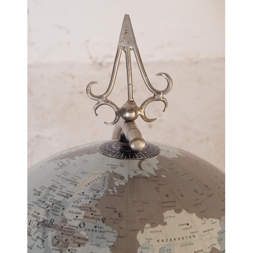 712 - A contemporary globe of cream colourway sitting on a silver floor standing stainless steel stand. Me... 