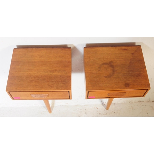 716 - A pair of mid century teak wood wall mounted & free standing bedside tables. Each raised on single t... 