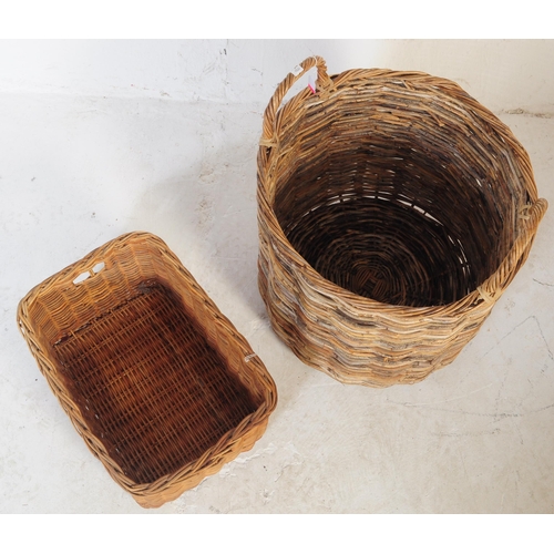 730 - A large mid 20th Century wicker log bin having open top with carry loops. The basket of large size a... 