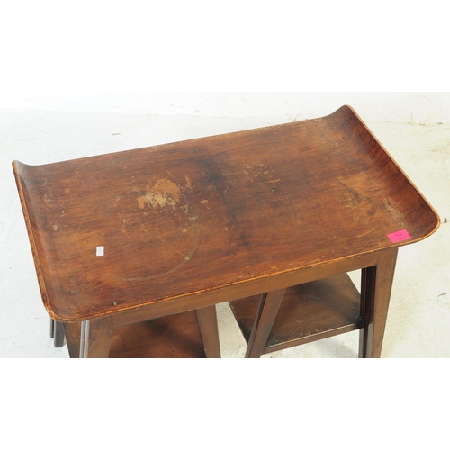 734 - A vintage mid 20th century ply wood ski top nest / occasional / coffee tables. Having one larger one... 