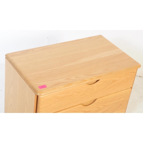 741 - Hulsta - A 20th century vintage Hulsta light beech bedside cabinet. The cabinet having a bank of twi... 