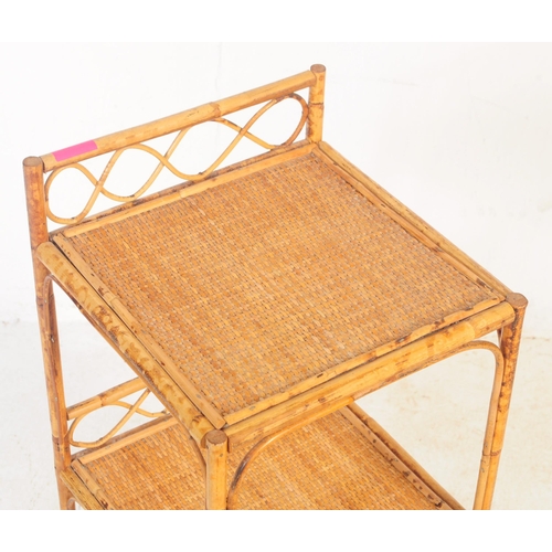 747 - A collection of vintage mid 20th century bamboo furniture items. To include a pierced double bed hea... 