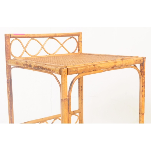 747 - A collection of vintage mid 20th century bamboo furniture items. To include a pierced double bed hea... 