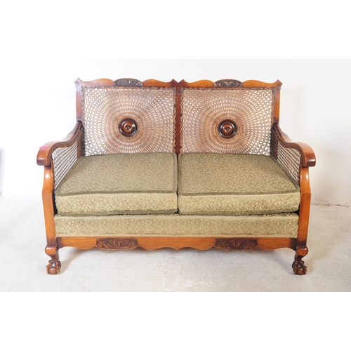 766 - An early 20th century mahogany and cane begere suite comp[rising of small proportioned two seater so... 