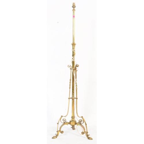 946 - A 19th century Victorian converted brass standard lamp. The lamp with hoof feet to splayed legs with... 