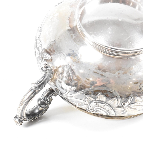 10 - A Georgian hallmarked silver sugar bowl. The George IV bowl having a circular plinth raising to a bu... 