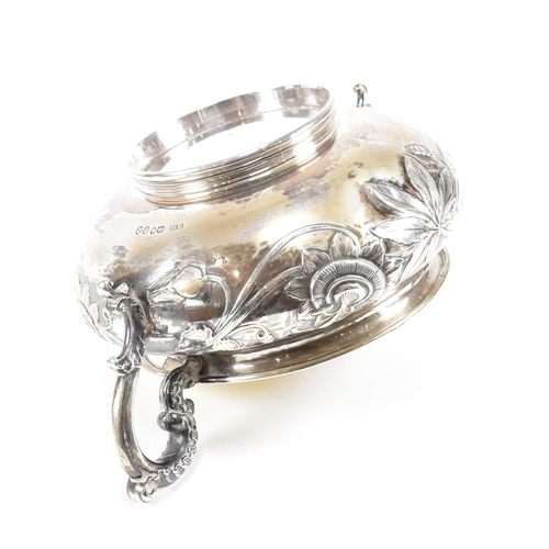 10 - A Georgian hallmarked silver sugar bowl. The George IV bowl having a circular plinth raising to a bu... 