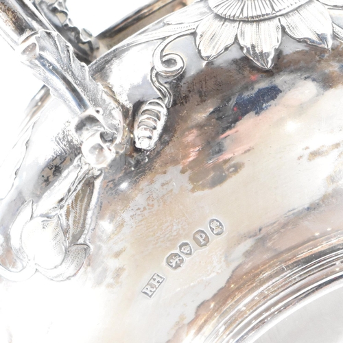 10 - A Georgian hallmarked silver sugar bowl. The George IV bowl having a circular plinth raising to a bu... 