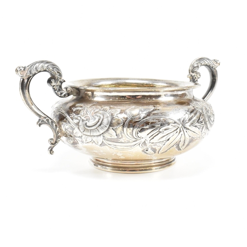 10 - A Georgian hallmarked silver sugar bowl. The George IV bowl having a circular plinth raising to a bu... 