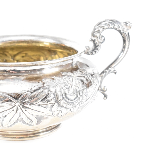 10 - A Georgian hallmarked silver sugar bowl. The George IV bowl having a circular plinth raising to a bu... 