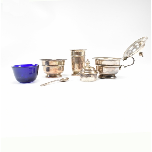 100 - A1930sÿhallmarked silver three piece condiment set. The set comprising of salt, cruet and condiment ... 