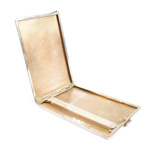 105 - Three cigarette cases. The lot to include a George VI hallmarked silver cigarette case. The case hav... 