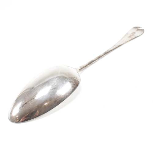 106 - A Victorian hallmarked silver serving spoon. The spoon hallmarked for London, 1862. Makers mark EE J... 