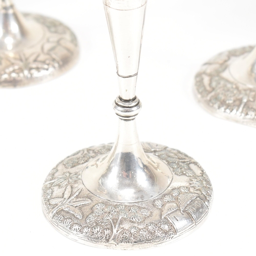 110 - An Dass and Duss Indian silver bowl and fluted vase centre piece set. The set decorated with repouss... 