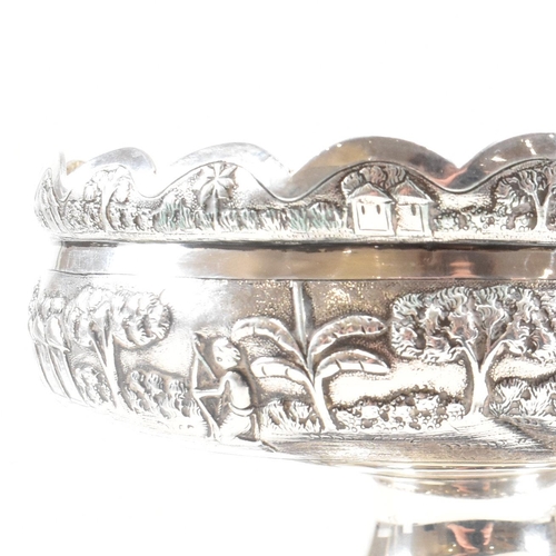 110 - An Dass and Duss Indian silver bowl and fluted vase centre piece set. The set decorated with repouss... 