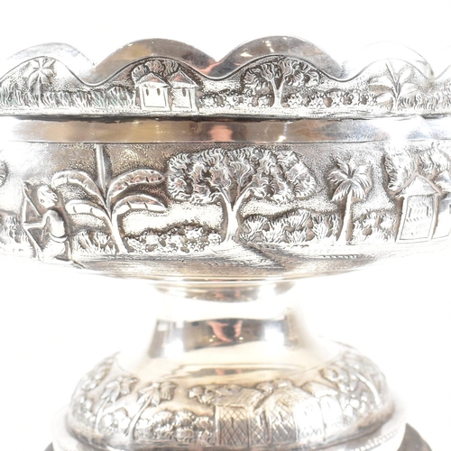 110 - An Dass and Duss Indian silver bowl and fluted vase centre piece set. The set decorated with repouss... 