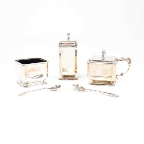 114 - A cased five piece hallmarked silver cruet set. The set to include a pepper shaker, salt cellar and ... 