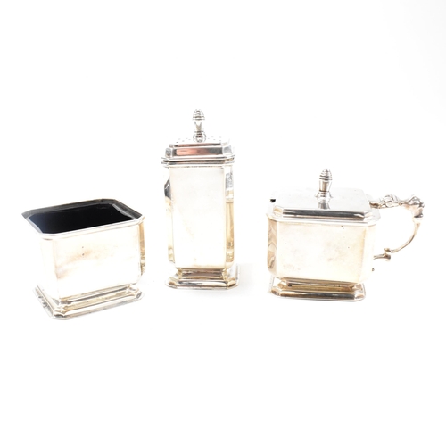 114 - A cased five piece hallmarked silver cruet set. The set to include a pepper shaker, salt cellar and ... 