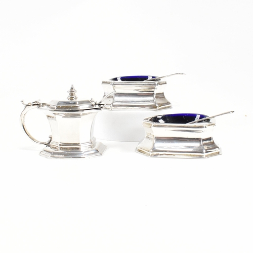 115 - A pair of Victorian hallmarked silver salts and later condiment pot. The salts having an octagonal s... 