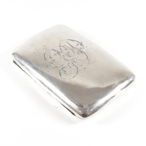 119 - An Edwardian hallmarked silver cigarette case. The Edward VII cigarette case having monogrammed init... 