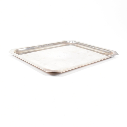 124 - A white metal French silver tray. The tray being of rectangular form. Inscribed to centre 'Martell X... 