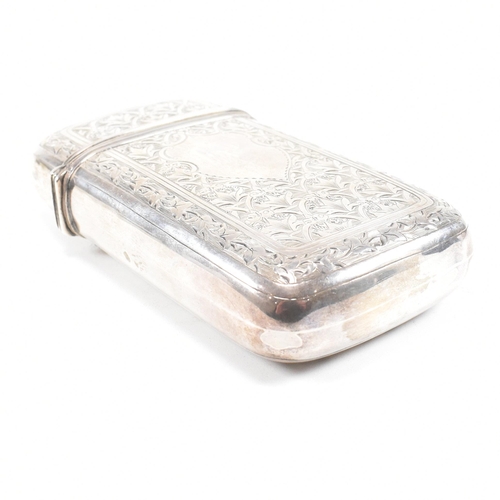 128 - A Victorian hallmarked silver cigar case. The case having an etched foliate design to body with cent... 