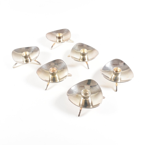 13 - A set of six Danish Mid Centuryÿsilver plated candlestick holders. The set each being marked Cohr De... 