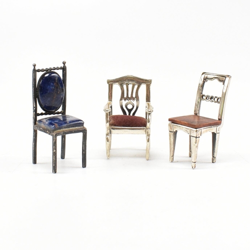 135 - Threeÿ Italian white metal and silver dolls house chairs. The chairs to include two Italian marked 9... 