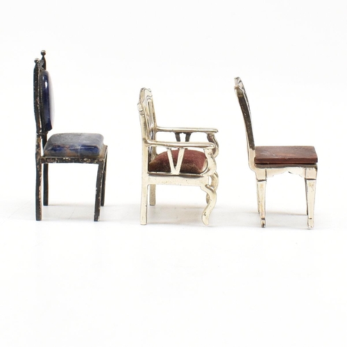 135 - Threeÿ Italian white metal and silver dolls house chairs. The chairs to include two Italian marked 9... 