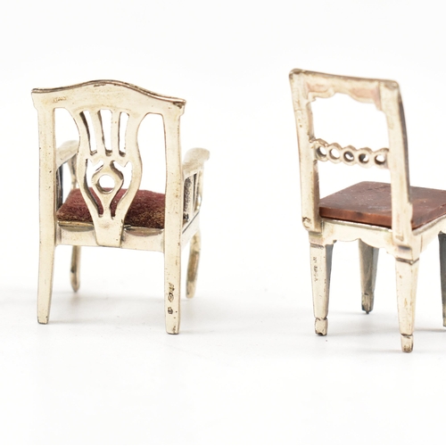 135 - Threeÿ Italian white metal and silver dolls house chairs. The chairs to include two Italian marked 9... 