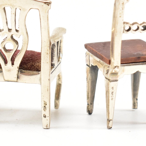 135 - Threeÿ Italian white metal and silver dolls house chairs. The chairs to include two Italian marked 9... 