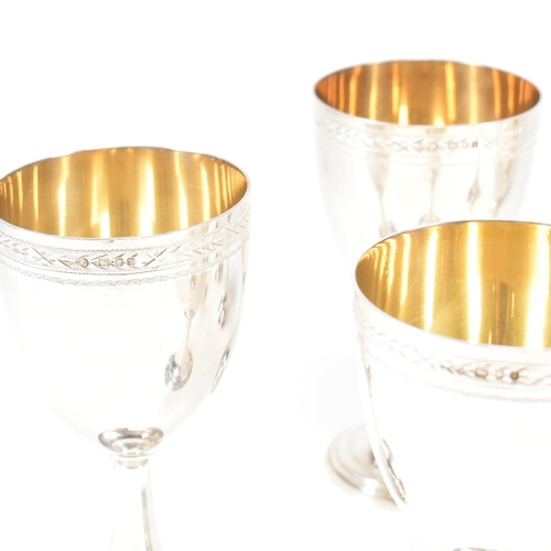 14 - Six 1970's hallmarked silver goblets. The six goblets each standing on a circular stepped plinth bas... 